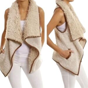 Love Tree faux fur sherpa vest with a faux leather trim medium